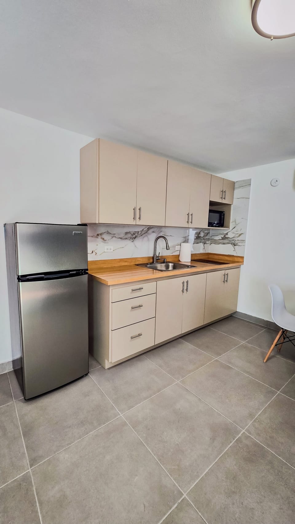 Full kitchen with amenities included. 