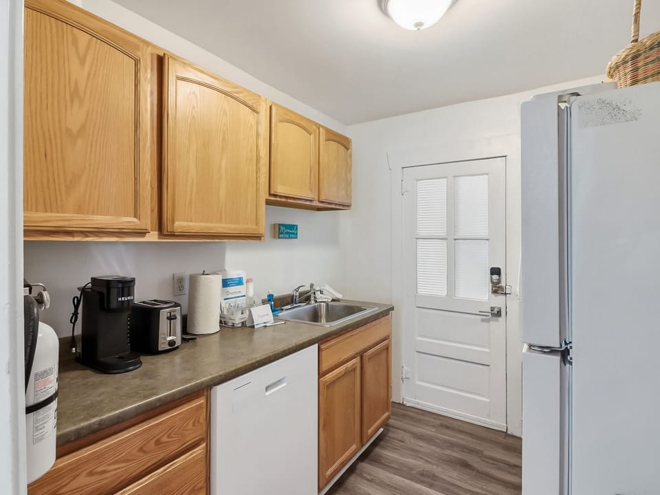 Kitchen with property's welcome kit 
