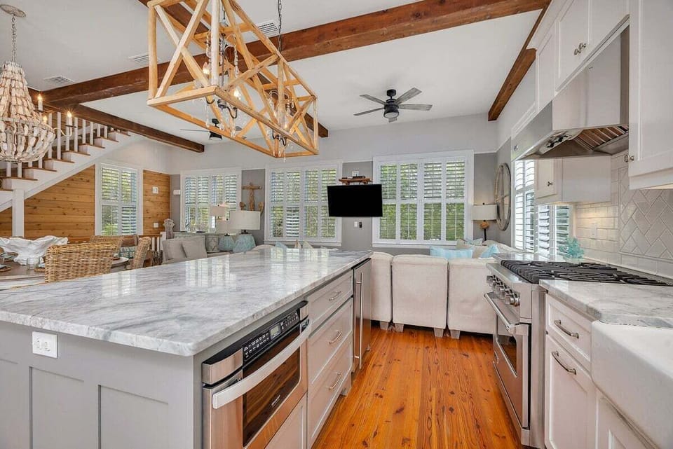 Open-concept kitchen, with view of dining and living area