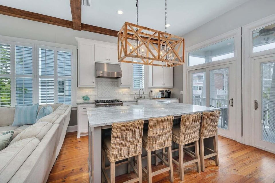 Modern kitchen with stainless steel appliances and island seating