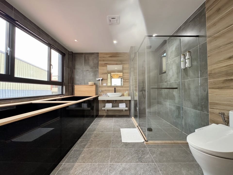 Family Room, Non Smoking | Bathroom | Hair dryer, slippers, bidet, soap