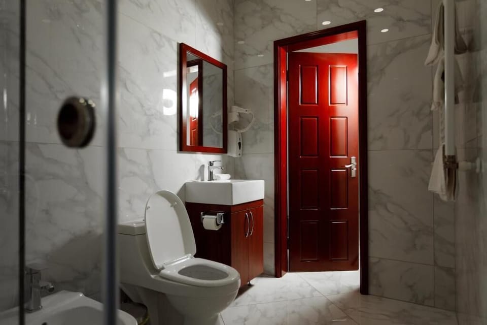 Deluxe Double Room, Balcony | In-room safe, desk, laptop workspace, blackout drapes