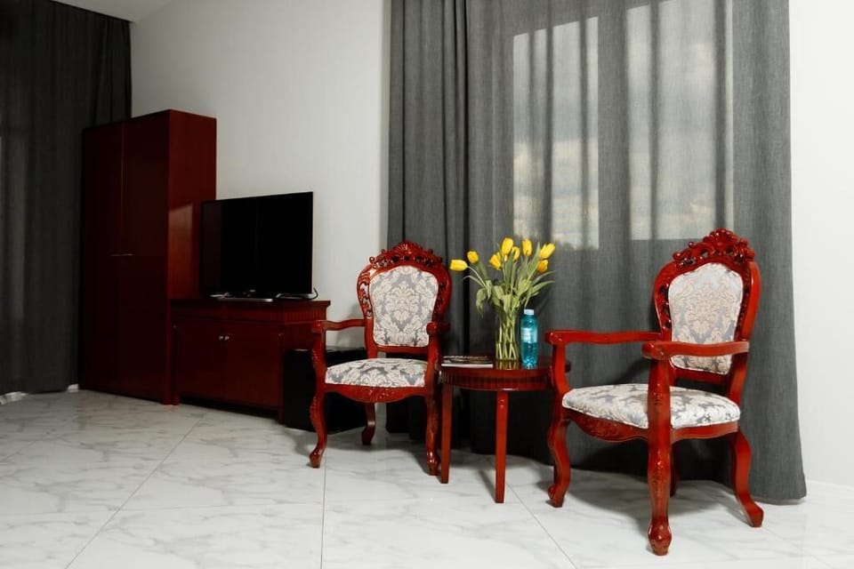 Deluxe Double Room, Balcony | In-room safe, desk, laptop workspace, blackout drapes