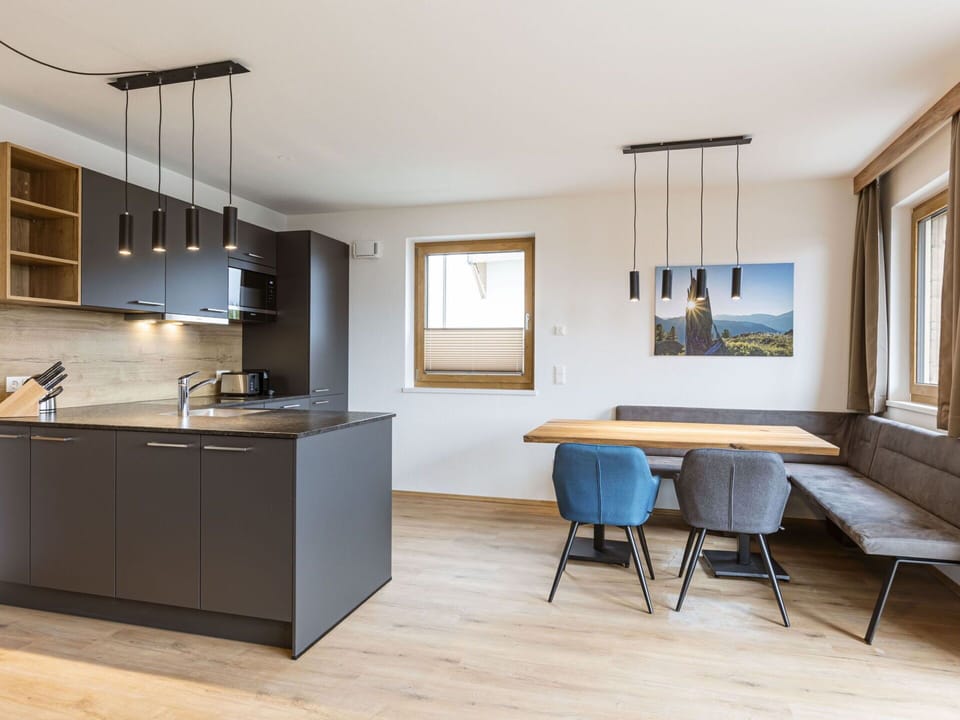 Furniture, Interior Design, Flooring, Wood, Floor, Ceiling, Table, Wood Flooring, Light Fixture, Apartment