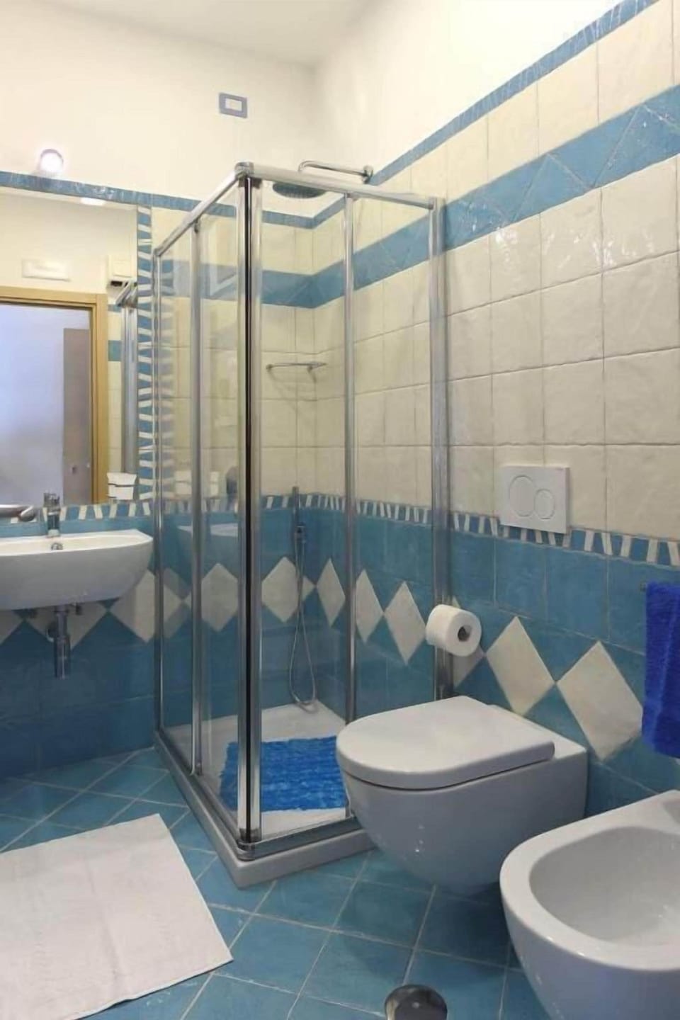 Basic Triple Room, Balcony, Mountain View | Bathroom | Shower, hair dryer, towels, soap