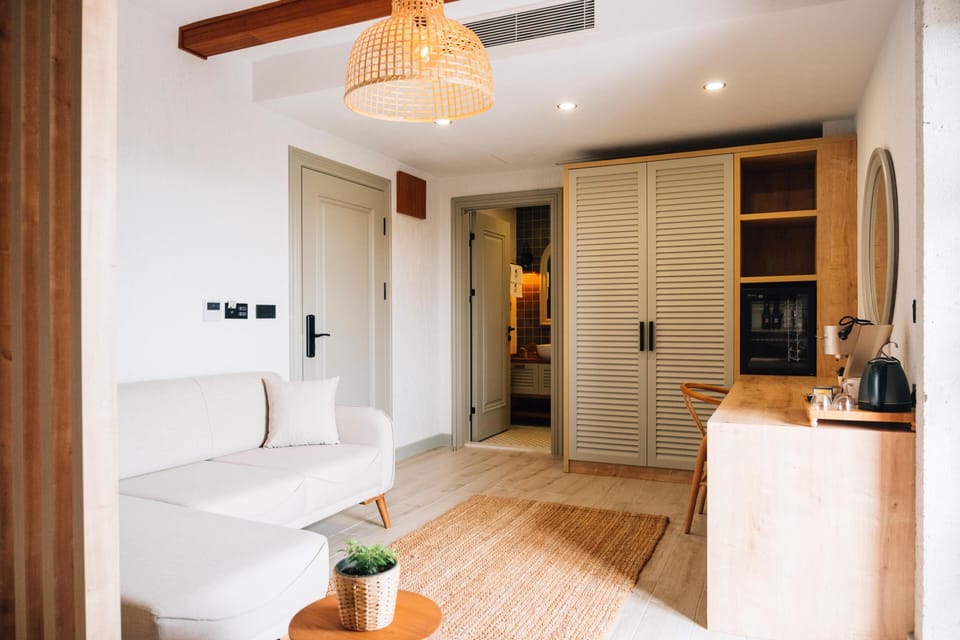 Comfort Room, Balcony, Garden View | Free minibar, in-room safe, individually furnished, laptop workspace