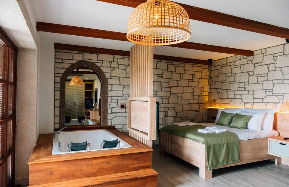 Deluxe Room, Balcony, Mountain View | Free minibar, in-room safe, individually furnished, laptop workspace