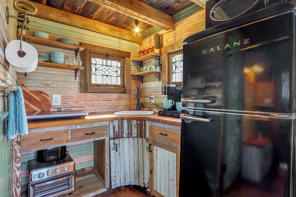 Kitchenette with a fridge