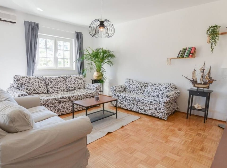 Villa (Villa With Pool) | Living room | 32-inch flat-screen TV with cable channels