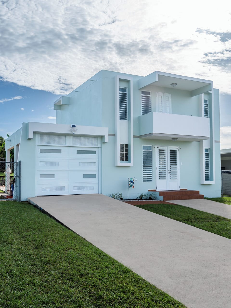 Enhance a private home with spacious driveways and a garage for parking.