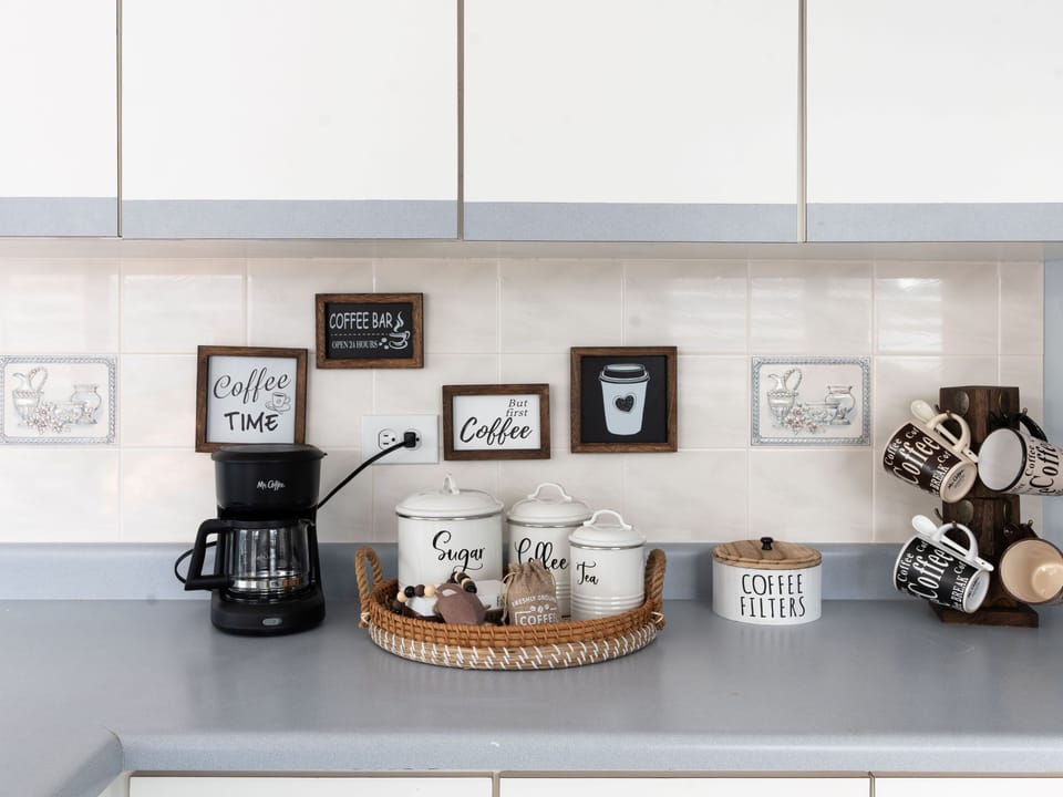 coffee, filters, creamer, sugar, and tea for your enjoyment.