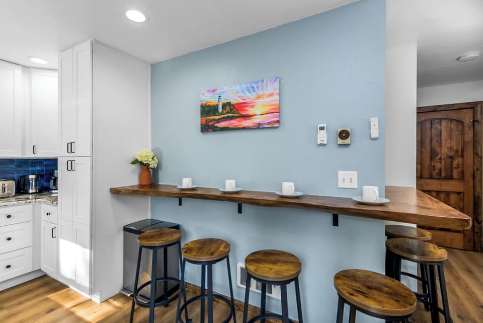 Its open layout keeps you connected with the kitchen and dining area.
