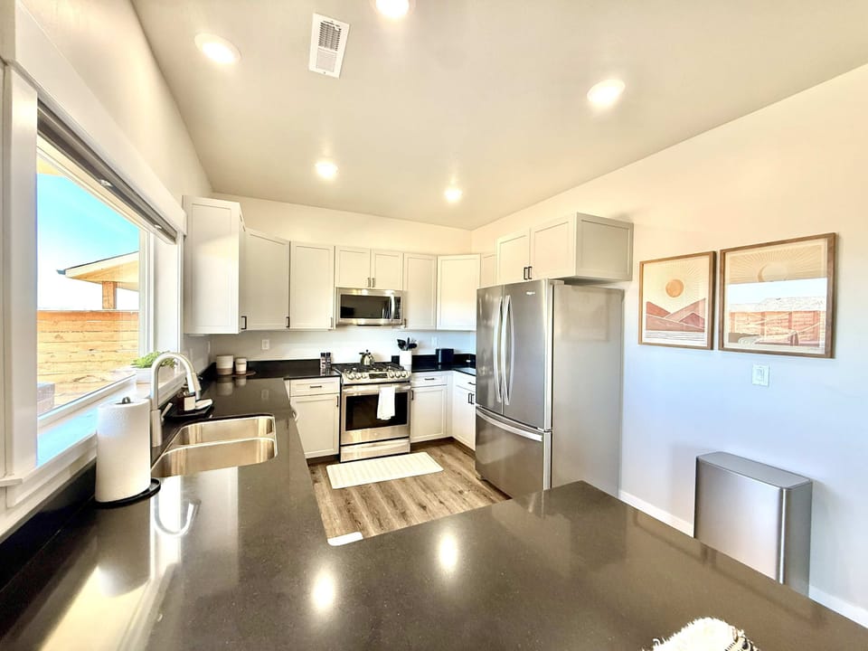 Everything you reach for will be there in this fully appointed kitchen. The open concept with the dining area makes this a convenient space to gather in