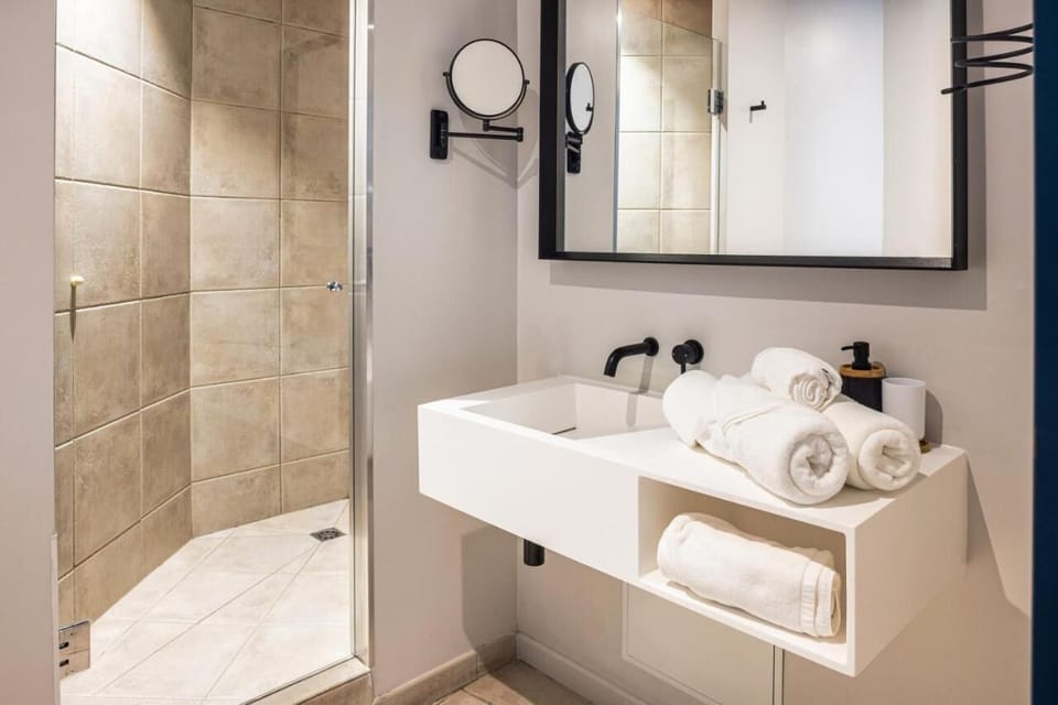 Hair dryer, towels, soap, shampoo