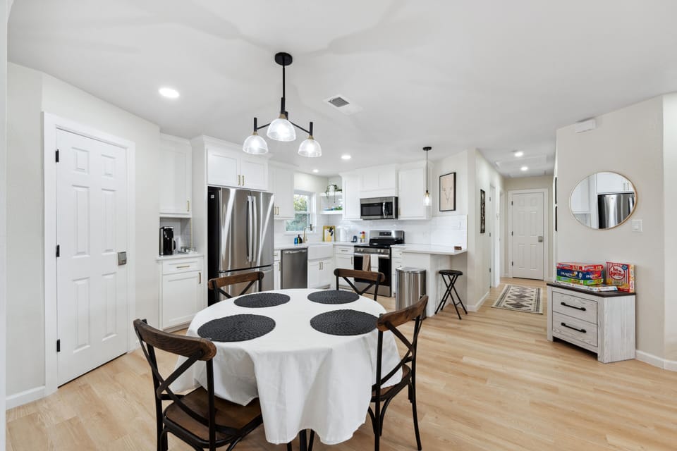 Enjoy meals with family and friends in this inviting kitchen, fully equipped for your culinary adventures. After visiting nearby attractions like the Richardson Farmers Market, return here to unwind and refuel.