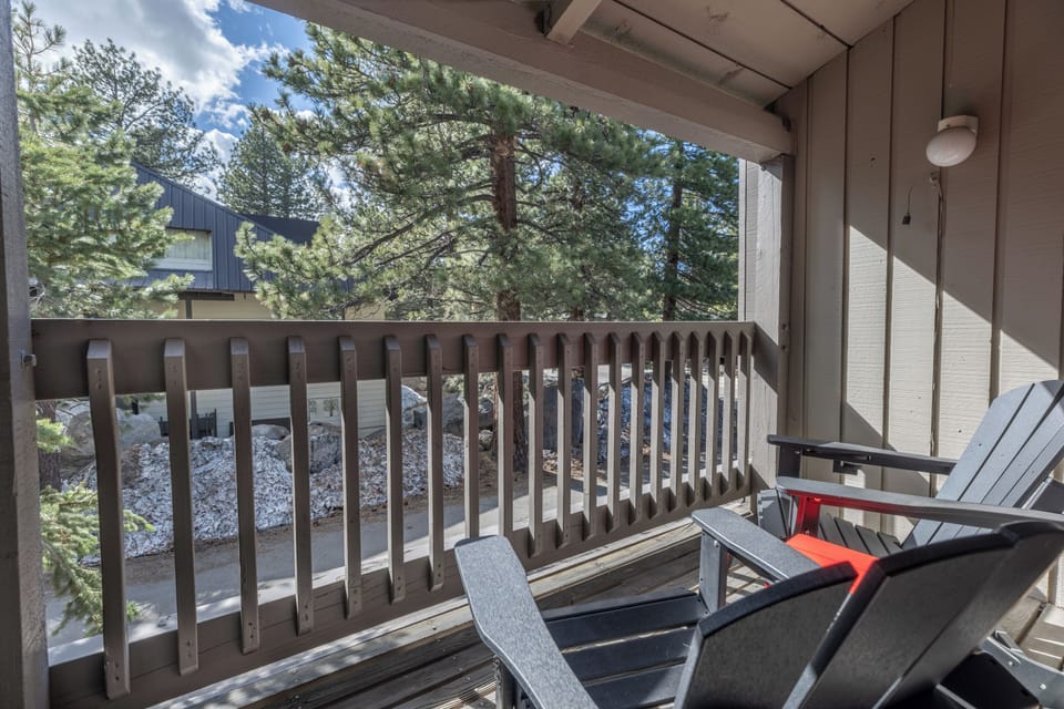 Step out onto your private master bedroom balcony and unwind in comfortable Adirondack chairs, surrounded by the fresh scent of pine and tranquil mountain views. This peaceful outdoor retreat is the perfect spot to enjoy your morning coffee or relax under the stars after a day of adventure.