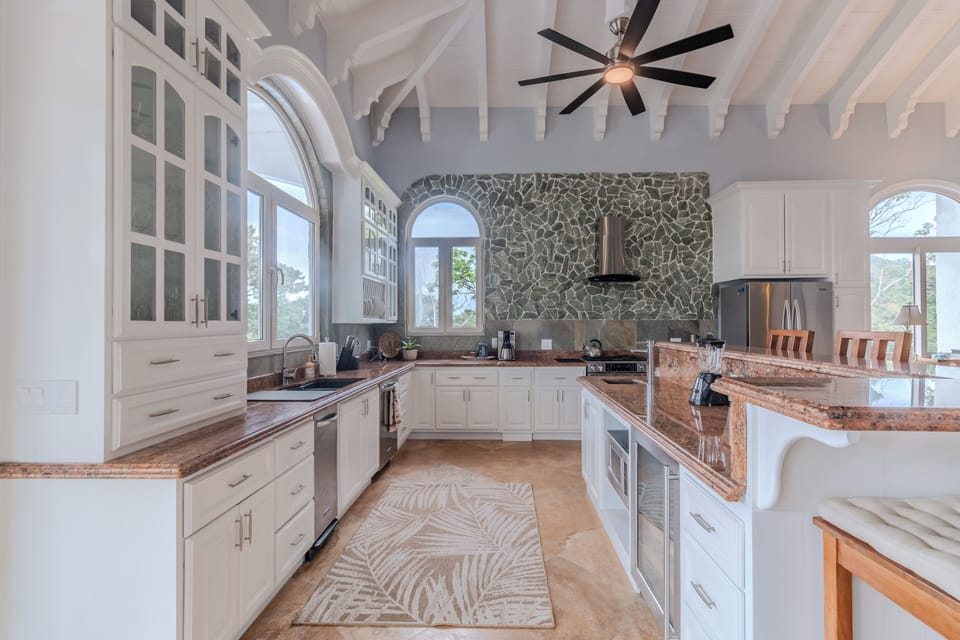 Very large fully equipped kitchen with additional wine cooler.