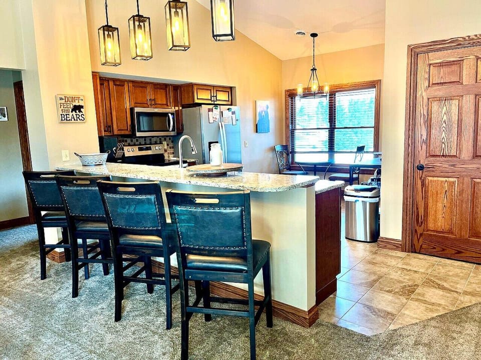 Cook up your favorites in the fully equipped kitchen with granite countertops, stainless steel appliances and eat-in dinette table