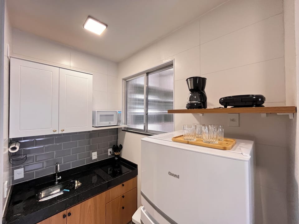Microwave, stovetop, cookware/dishes/utensils