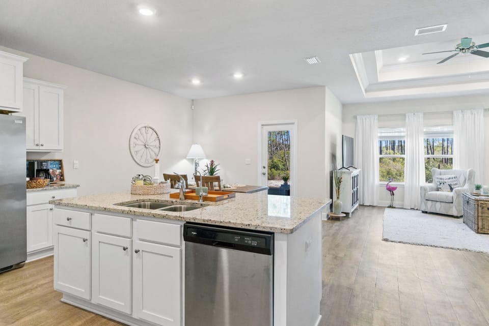 Your bright, open kitchen flows seamlessly into the living area, perfect for cooking and entertaining together.