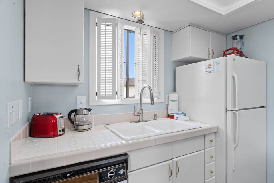 Skip the lines at the restaurants and enjoy a quiet night in. Our fully stocked kitchen makes meal prep a breeze after a day at the beach.