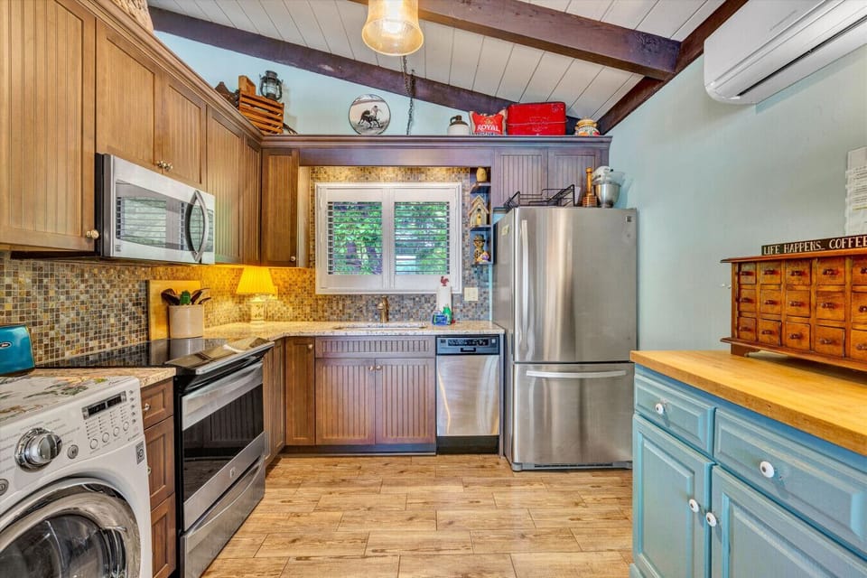 Intimate kitchen with stylish finishes and efficient use of space.