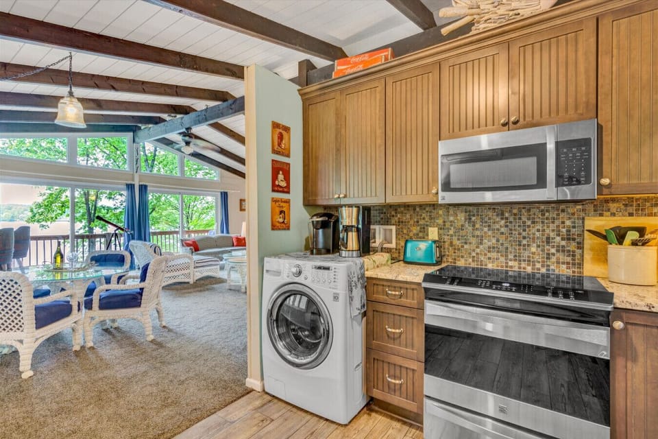 Intimate kitchen with stylish finishes and efficient use of space.