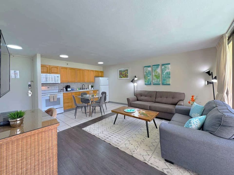 Come on in and relax! This spacious open-concept condo features a couch and pull-out sleeper sofa, and a fully-equipped kitchen with a dining area, all set and ready for your stay!