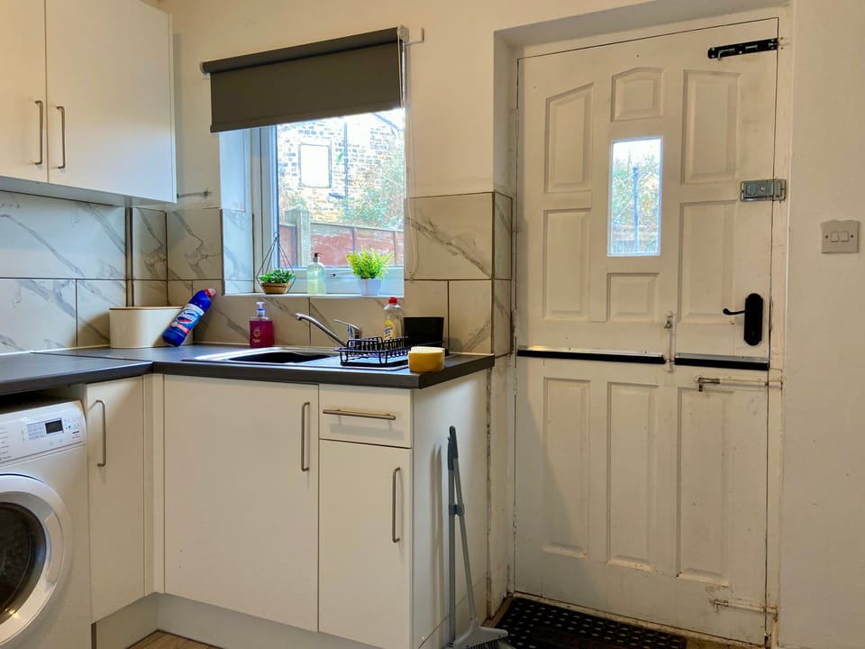 Kitchen with back door entrance