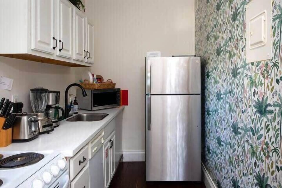 Paradise Suite full kitchen with fridge, stove, oven, dishwasher, microwave, blender,  toaster and all the essentials making you feel right at home 