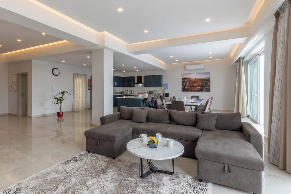 Family Villa, Multiple Bedrooms (Magnifica Gozitan Villa Pool And) | Living area | 21-inch flat-screen TV with digital channels, fireplace