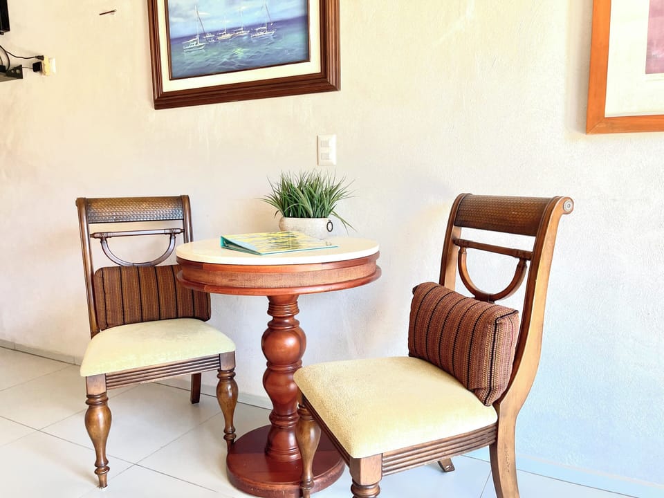 Deluxe Room, Multiple Beds, Non Smoking, Garden View | Minibar, in-room safe, laptop workspace, blackout drapes