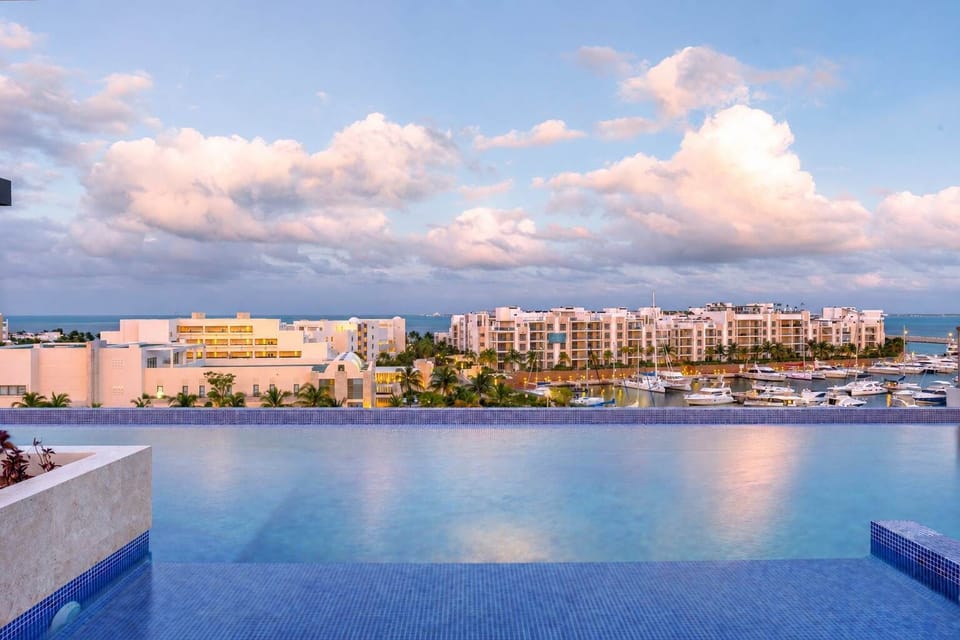 Stunning rooftop infinity pool with breathtaking ocean views.