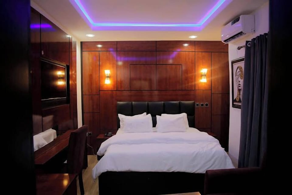 Deluxe Room, Balcony, City View | Desk, laptop workspace, blackout drapes, soundproofing