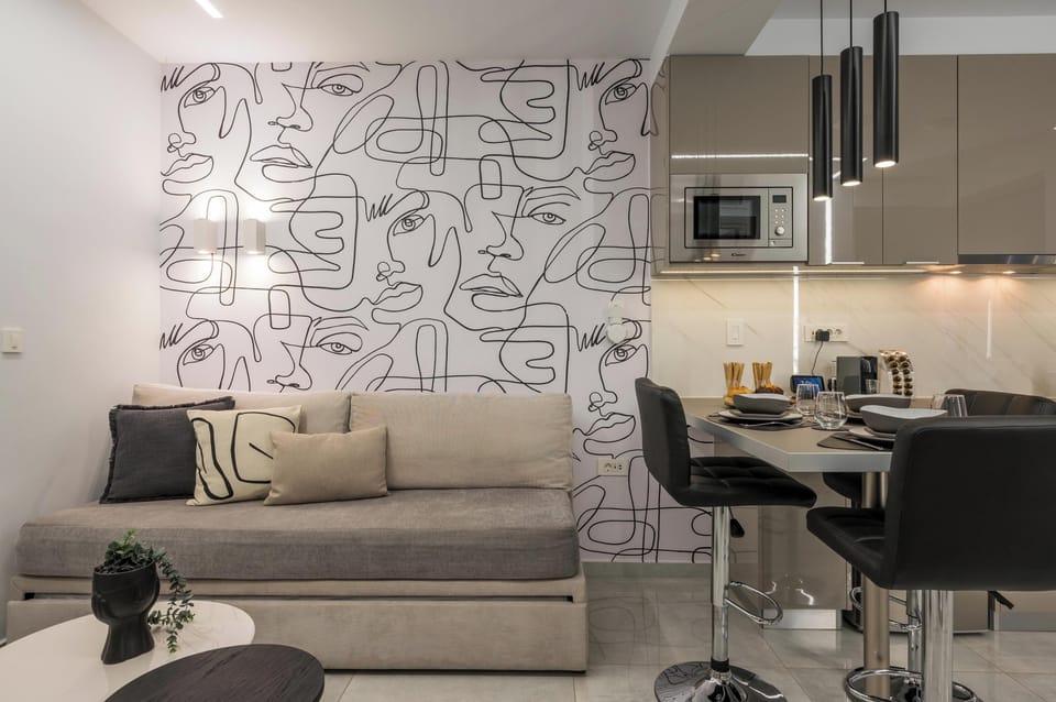 Luxury Apartment | Living area | 50-inch Smart TV with digital channels, smart speakers