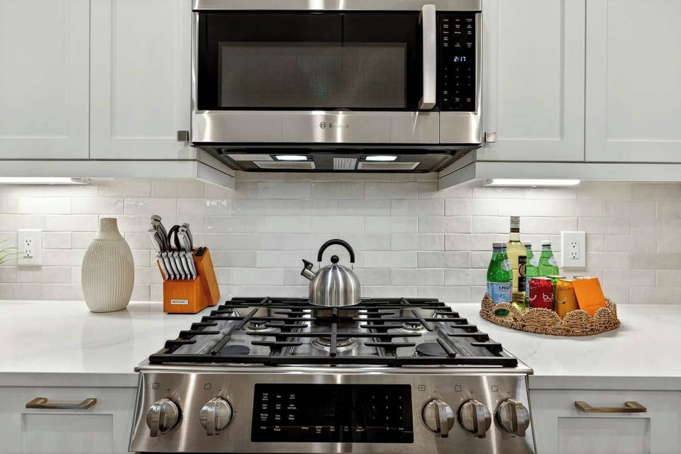 Cook in Style – This kitchen features high-end appliances, ample storage, and everything you need for a seamless culinary experience.