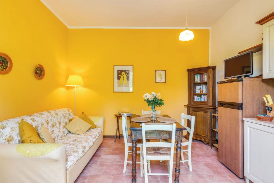 Interior Design, Wall, Flooring, Furniture, Yellow, Ceiling, Room, Floor, Home, Orange
