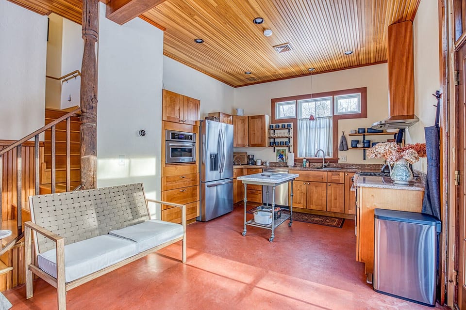 Chef's kitchen with stainless steel appliances, perfect for meals at home