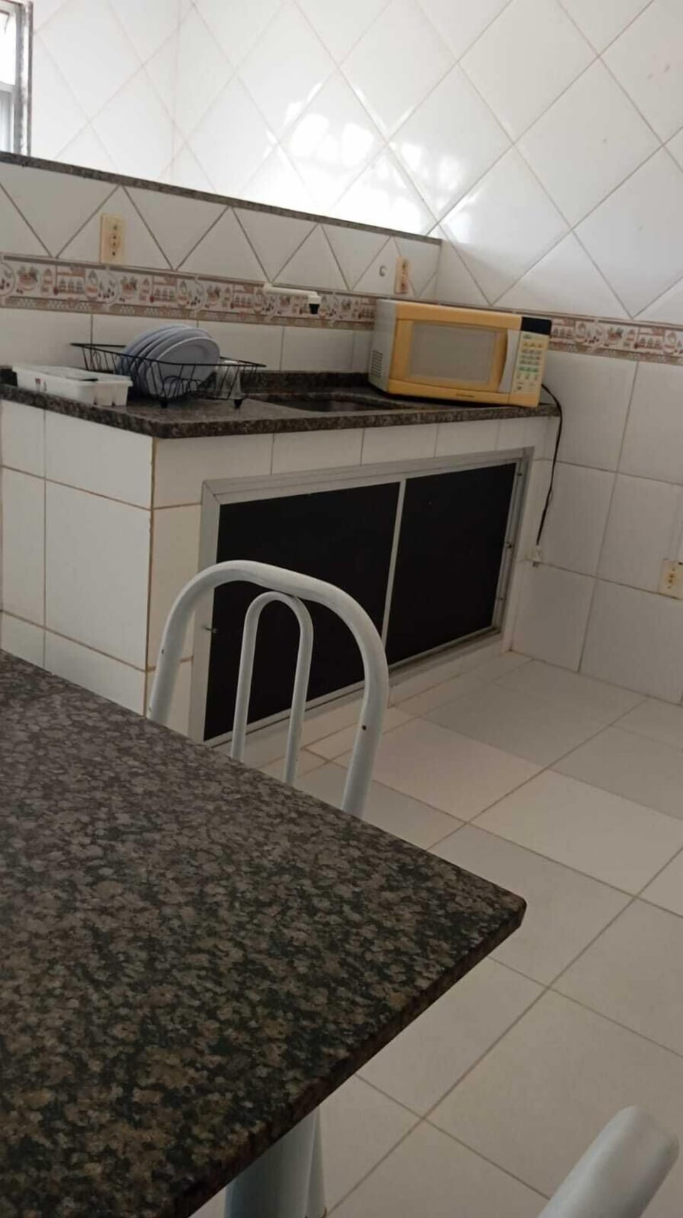 Basic Apartment, City View | Private kitchen | Mini-fridge, microwave, cookware/dishes/utensils, dining tables