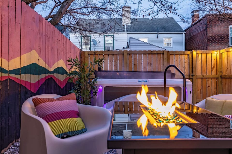 Soak in the hot tub, lounge by the fire, and enjoy the vibrant outdoor vibes. The perfect place to unwind after a day in Pittsburgh! 🌙✨