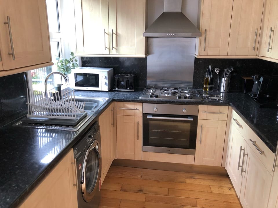 Apartment | Private kitchen | Fridge, microwave, oven, stovetop