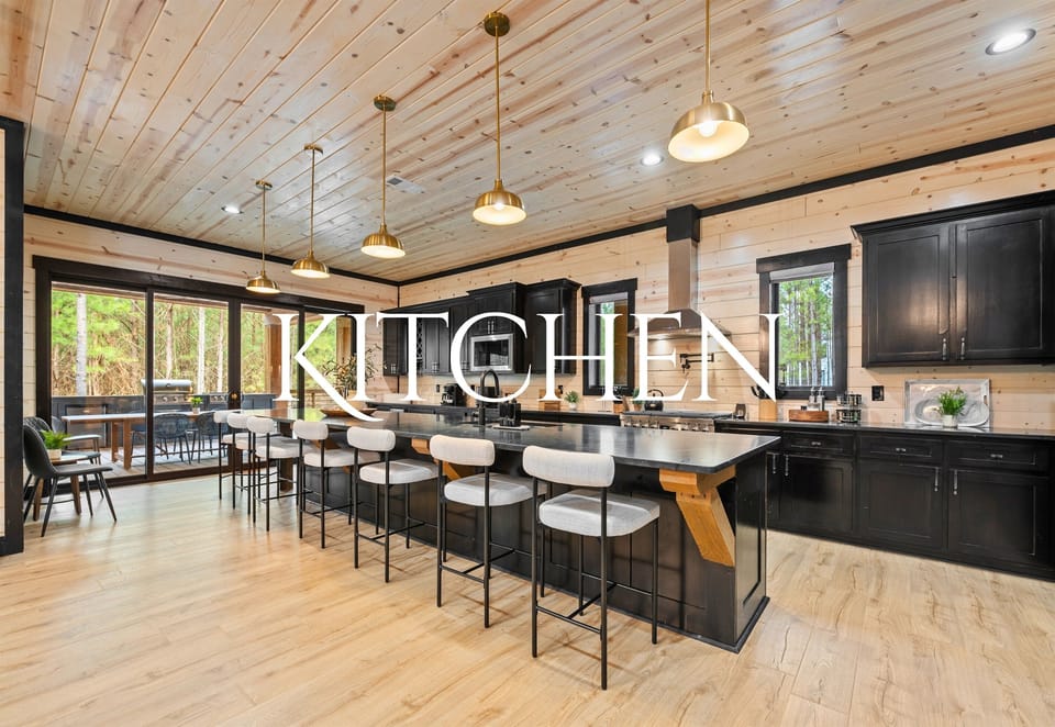 This stunning kitchen is as functional as it is beautiful, offering plenty of seating and high-end appliances so you can cook, entertain, and enjoy time together with ease.