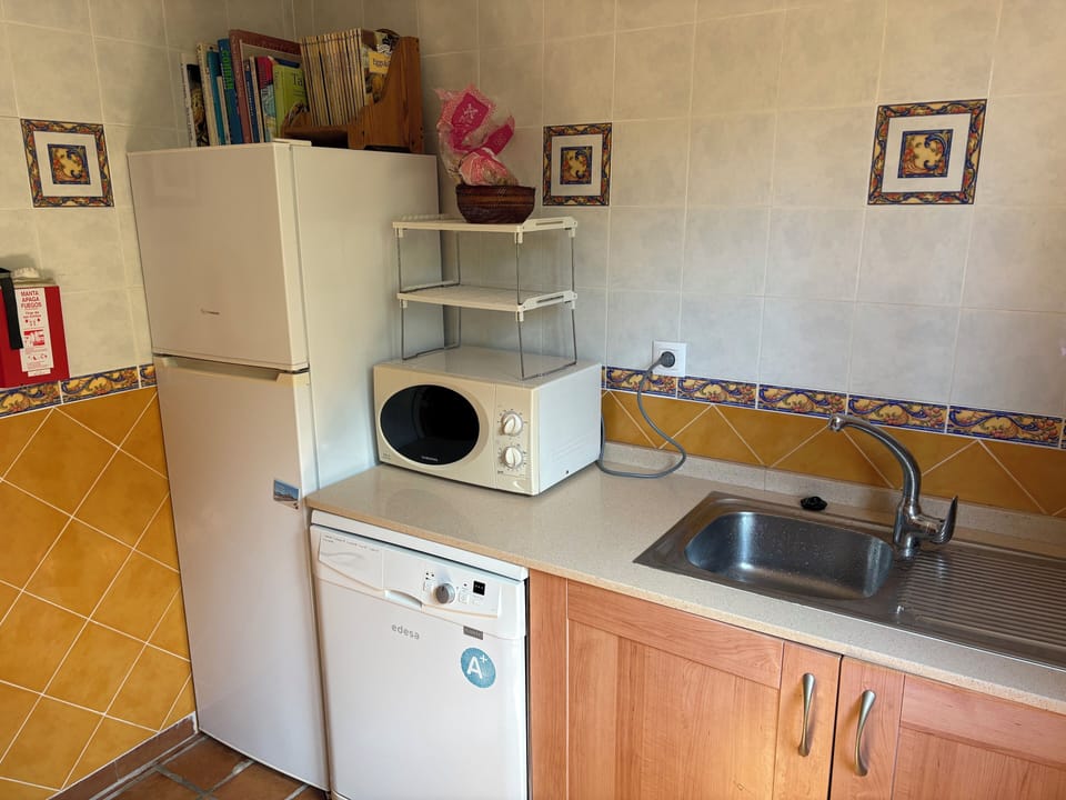 Kitchen with Fridge/Freezer/Microwave/dishwasher - Washer and dryer in utility 