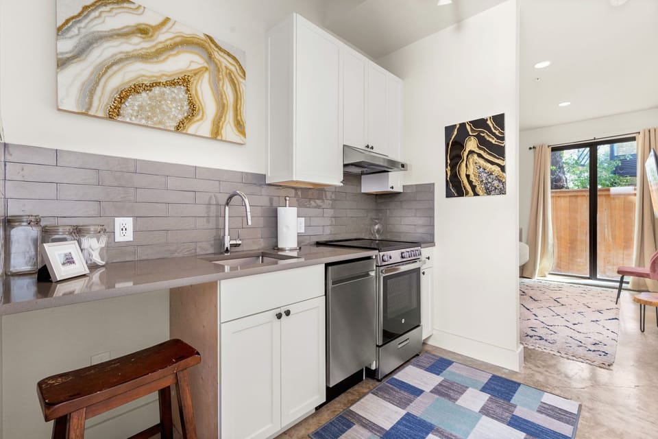 Fully stocked kitchen with both a drip and k-cup coffee maker. 