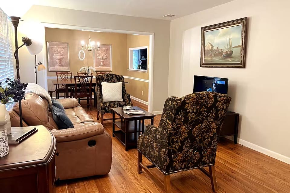Another view of the living and dining rooms from hallway entrance