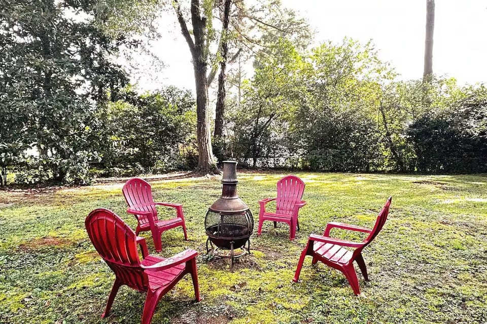 Relax and enjoy a night by the fire in the private, fenced back yard