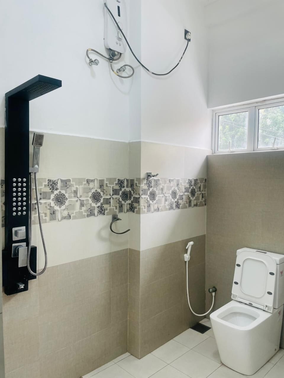Shower, towels, soap, toilet paper