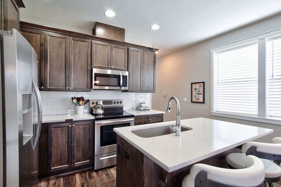Spacious island seating creates the perfect gathering place for meals and conversation. 