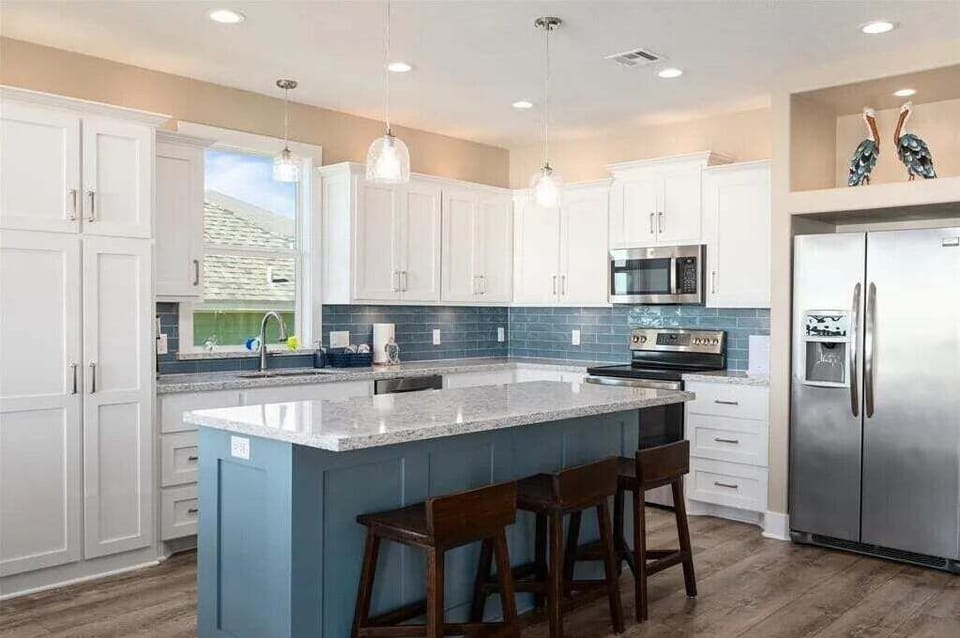 Modern kitchen with large island and bar seating in Crystal Beach TX vacation rental