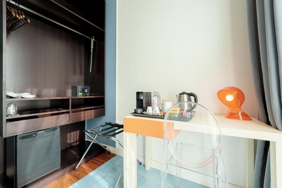 Standard Double or Twin Room | Minibar (free items), in-room safe, desk, blackout drapes